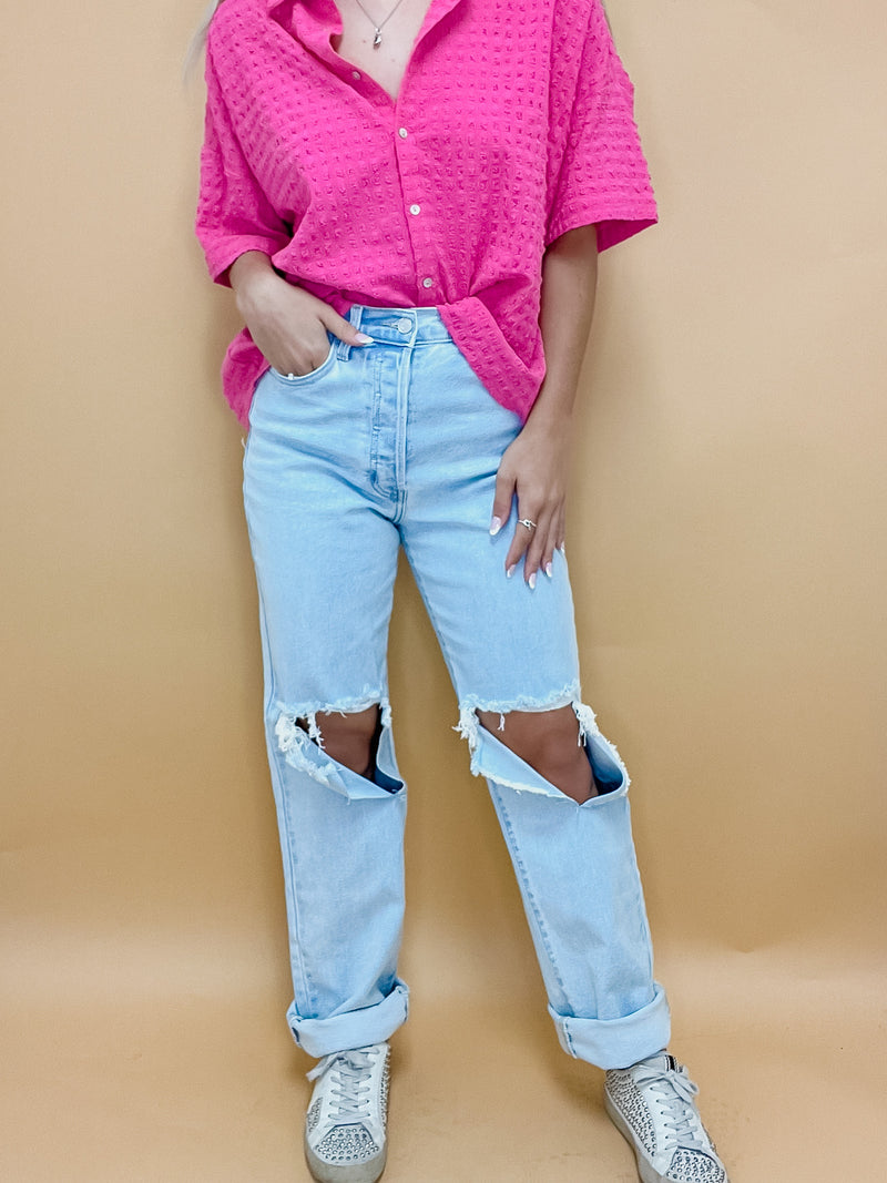 Ripped Knee Jeans