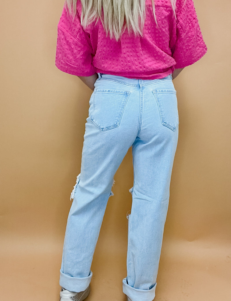 Ripped Knee Jeans